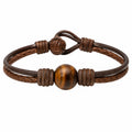 Bracciale intrecciato marrone con perla di occhio di tigre
